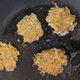 Latkes in oil.